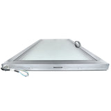 A flat, rectangular metal door (right) with a large glass panel center is shown lying horizontally. Durable and industrial, this Empura Refrigeration part features a silver handle on the right and exposed colored electrical wires on the left corner.