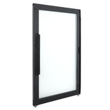 A black-framed glass door stands upright at an angle, showing both its handle and thin frame. The Door Left handle is long, vertical, and ridged—ideal for Empura Refrigeration units with a modern, minimalist design.
