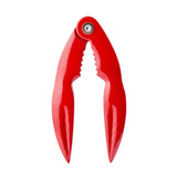 A red enamel nutcracker with curved handles and a serrated gripping area near the hinge, crafted from cast aluminum. Ideal for cracking the shells of nuts or tackling a tough lobster crack, it’s displayed against a white background.