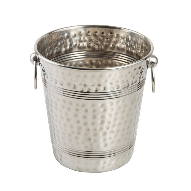A shiny, metallic ice bucket with a hammered texture, two round side handles, and decorative horizontal grooves. This stainless steel bucket is empty and standing upright on a white background.