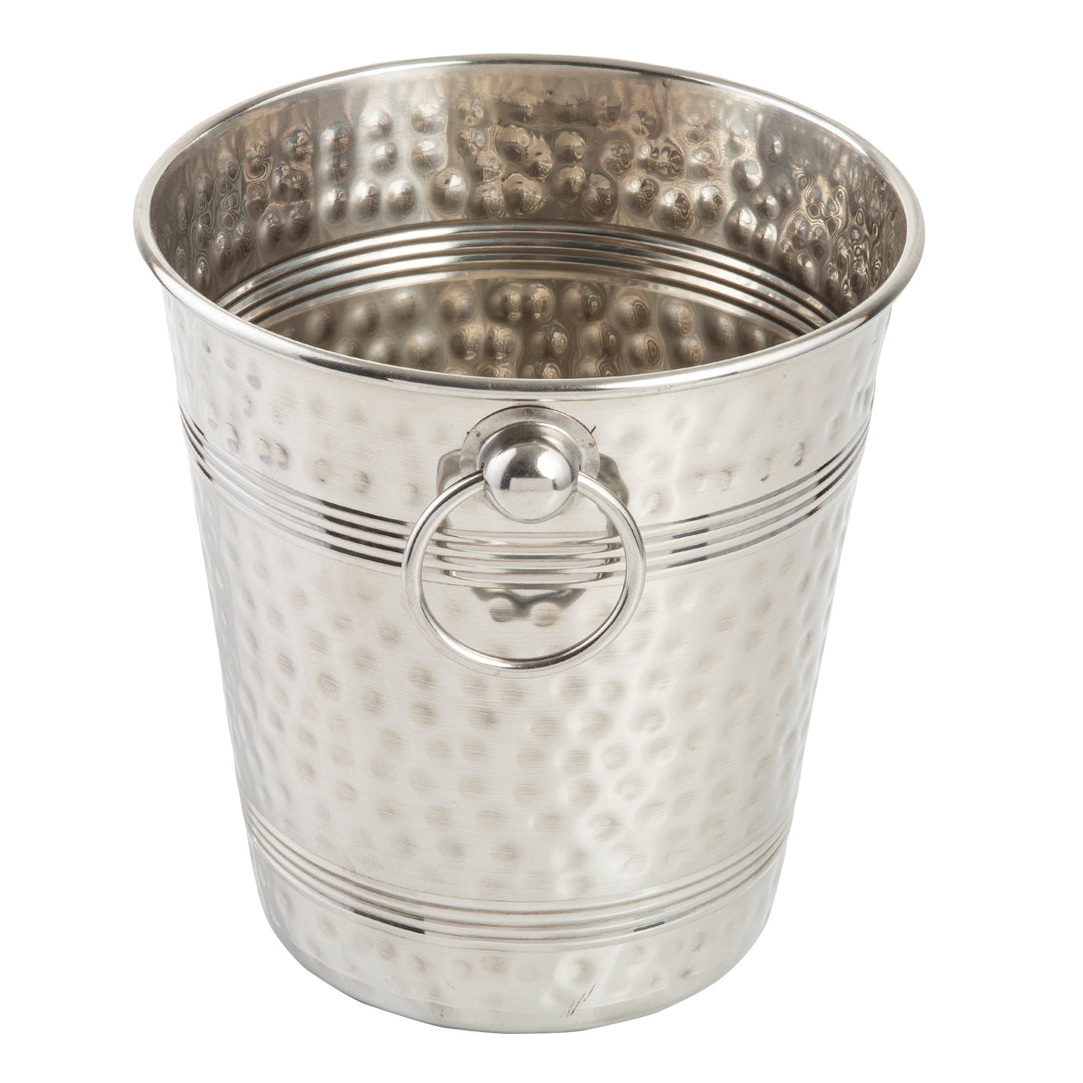 A shiny, stainless steel ice bucket with a hammered texture, horizontal grooved lines, and a round metal handle ring attached to the side. The TableCraft bucket is empty and photographed against a plain white background.