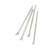 Four chrome plated corn holders are shown on a white background. Each features a textured grip and a forked, two-pronged end similar to shellfish forks. The holders are arranged diagonally and slightly overlap each other.