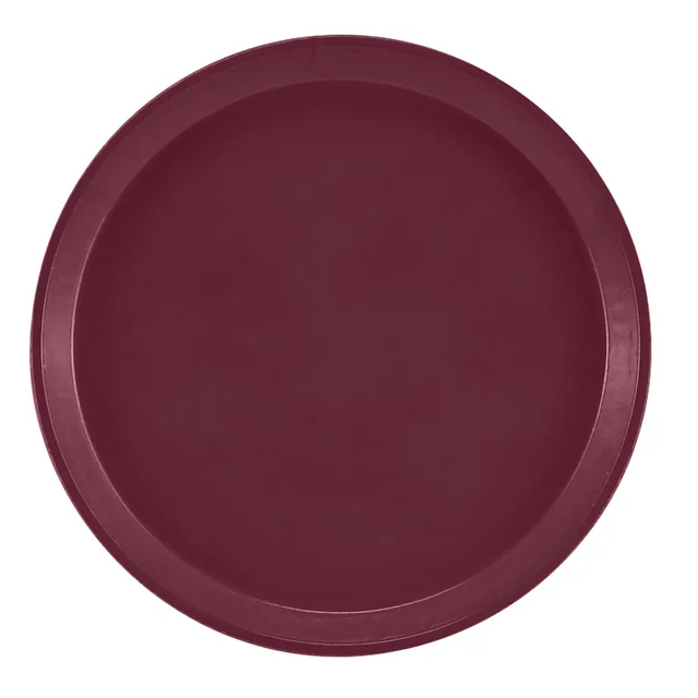 A round, deep burgundy-colored Serving Camtray is shown from above. This fiberglass tray features a raised edge, smooth matte finish, and is dishwasher safe. The surface has no visible patterns or decorations, set against a plain white background.