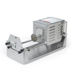 A stainless steel pasta extruder with a boxy motor housing, slotted vents, handle, and a die plate for shaping pasta—similar in build to a stainless steel fry cutter. Two parallel rods support the die, with control knobs on the front and a shallow tray base.
