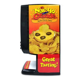 A Nacho Cheese Dispenser with a vibrant red and yellow label shows a bowl of bagged cheese topped with jalapeños, surrounded by chips. The text reads “El Nacho Grande Nacho Cheese Sauce” and “Great Tasting!” in bold, playful fonts.