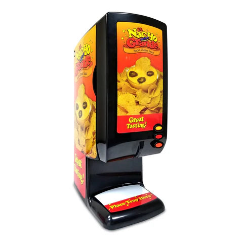 A black nacho cheese dispenser with El Nacho Grande branding uses a peristaltic pump to serve bagged cheese. The front and side display nachos topped with cheese and jalapeños. Three red buttons and a “Place Tray Here” area complete the design.
