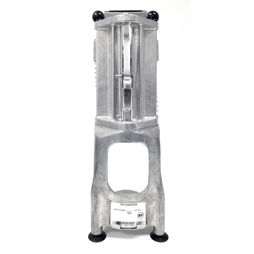 A commercial-grade, upright manual citrus wedger made of aluminum, featuring a rectangular frame, black rubber feet, and black round handles at the top. A label with model details is affixed near the base. The device stands on a white background.