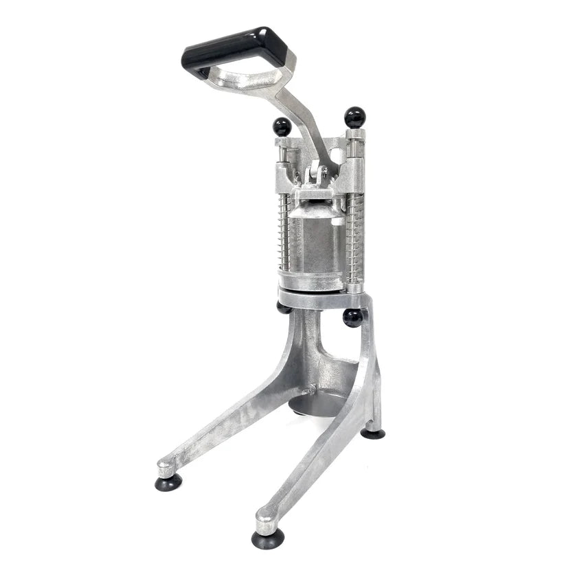 A silver and black manual press machine, similar to a Lemon Squeezer, stands upright on three rubber-tipped legs. Made of aluminum, it features a cylindrical chamber and a long, black-handled lever for pressing or crushing items within the chamber.