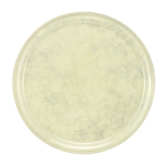 A round, flat plate with a slightly raised edge. Cream-colored with a subtle marbled or crackled pattern in light gray, this vintage-inspired Serving Camtray is smooth, glossy, and dishwasher safe for easy cleaning.