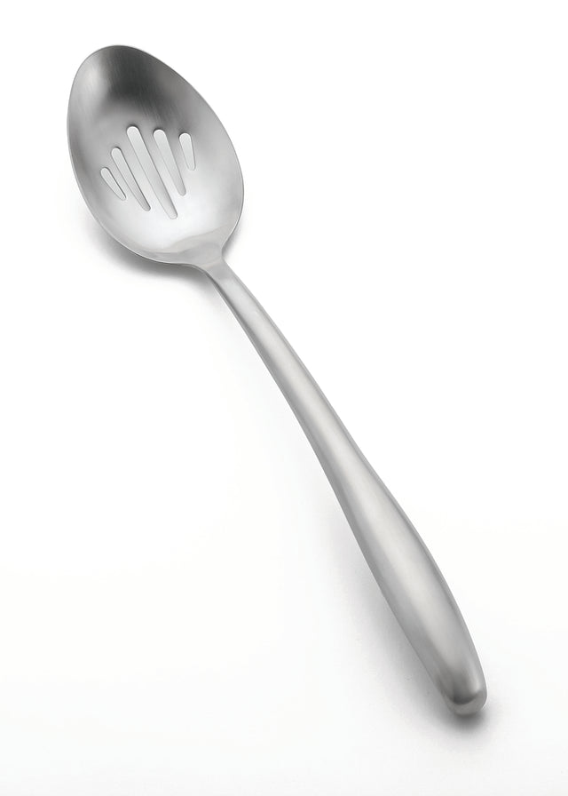 A stainless steel buffet spoon with a slightly rounded handle. This slotted buffet spoon features several narrow slots in the bowl for draining liquids from food. It is placed on a plain white background.