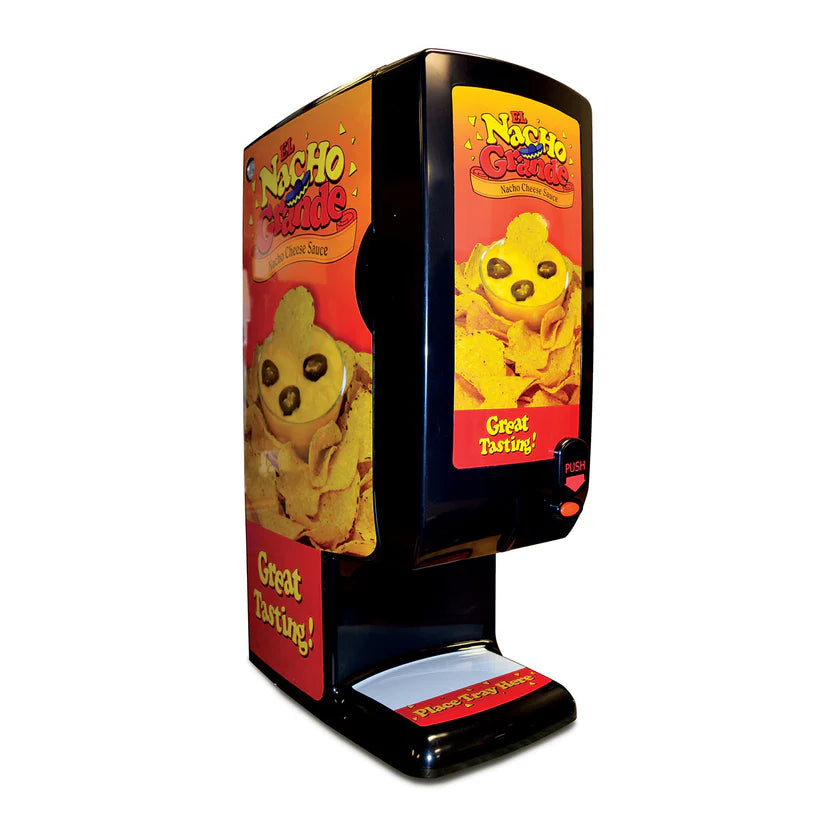 A black nacho cheese dispenser with colorful labels showing nachos smothered in cheese. Featuring a red Great Tasting! slogan, a single push button, a drip tray below, and a reliable peristaltic pump, all set against a plain white background.