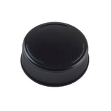A black plastic Invertatop End Cap with a smooth, slightly domed top and textured sides for grip. Three short, raised ridges are evenly spaced on the top surface. Commonly used for squeeze bottles, it is photographed on a white background.