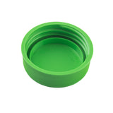 A bright green, round plastic bottle cap is shown against a white background. Ideal for squeeze bottles, the cap has a textured side for grip, smooth inner threading, and the inside top features recycling symbols and embossed text.
