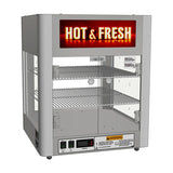 A stainless steel countertop food warmer display case with three wire shelves, glass sides, and a lighted “HOT & FRESH” sign in bold yellow and red. Control buttons, vents, and warning labels are visible at the bottom front.