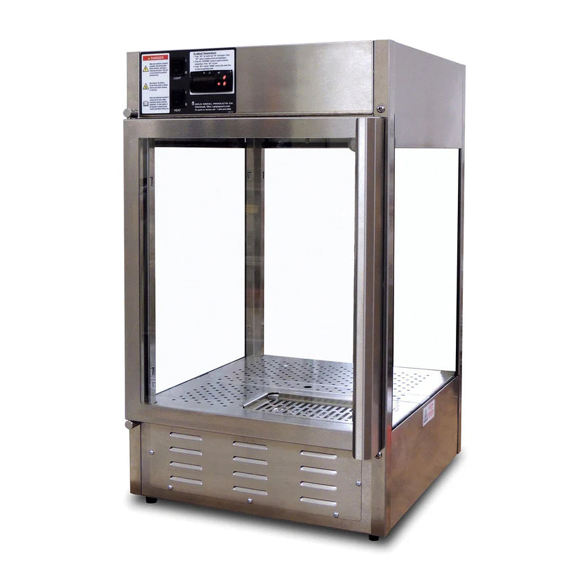 A stainless steel countertop food display warmer with a clear glass front and sides, perforated metal shelf, control panel with warning labels at the top front, air vents below, and a well-lit interior—perfect as a humidified display cabinet.