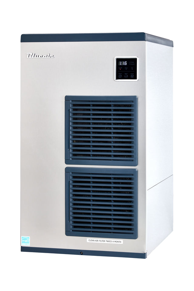 A silver and blue commercial Ice Machine with air-cooled technology, featuring two large front vents, a digital display panel at the top right, and the brand name “Pilmolin” embossed at the top left. The unit stands alone on a white background.