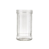 A clear, empty glass jar with vertical grooves and a wide opening is centered on a plain white background. This 12 oz cylindrical dispenser features a thick base, no lid, and is dishwasher safe for easy cleaning.