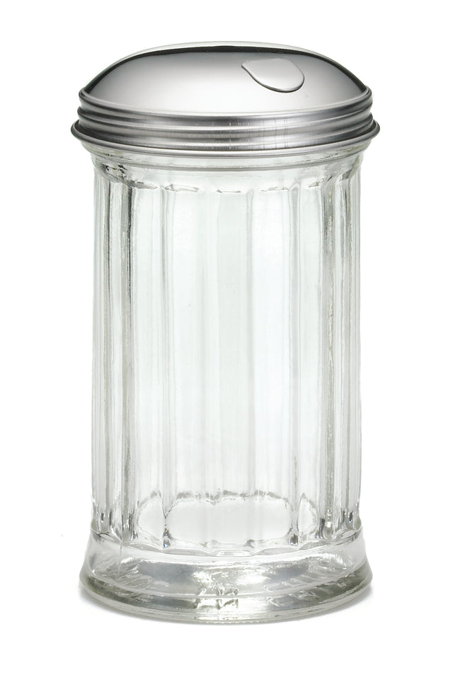 A clear, empty, fluted glass sugar dispenser with a shiny metal pourer lid and a small slot for pouring. The cylindrical container stands upright on a white background and is dishwasher safe.
