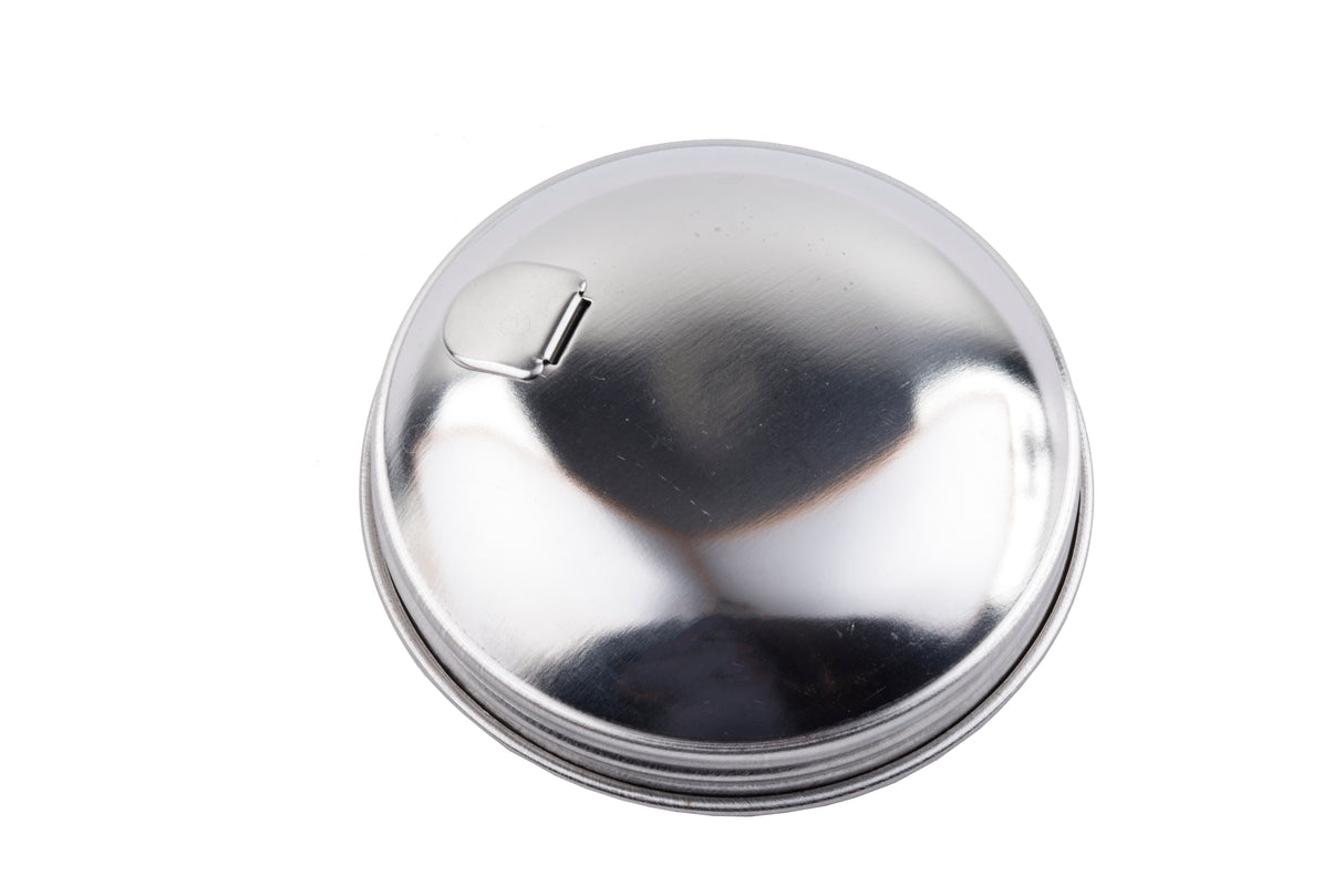 A shiny, round, stainless steel lid with a small flip-up tab is shown on a white background. The lid features smooth, reflective surfaces and grooves along the edge, suggesting it is for a container or sugar pourer top.