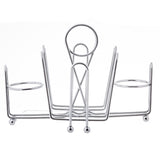 A chrome-plated metal toast rack with five curved slots stands upright on four small round feet. The central arch features a circular handle for easy carrying. This minimalist combination rack appears clean and modern.