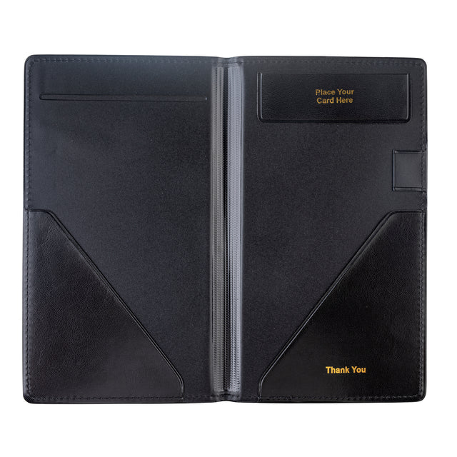 An open black and brown vinyl check presentation holder with two corner pockets, a vertical slot on the left, a transparent center sleeve, and a “Place Your Card Here” slot. “Thank You” is printed in gold on the TableCraft-designed bottom right pocket.