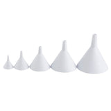 A plastic funnel set featuring five white funnels of increasing size is arranged in a row on a plain white background. Each dishwasher safe funnel has a wide base and narrow spout, creating a minimalistic, well-lit presentation.