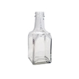 A clear, empty 6 oz. glass bottle with a square base, flat sides, and a short, narrow neck with threading for a cap. This dishwasher safe replacement jar stands upright on a white background.