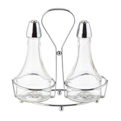 Two clear glass bottles with metal lids sit side by side in a shiny chrome plated rack with a handle. Designed as an Oil & Vinegar Dispenser, the elegant set features wide bases and narrow necks for easy pouring of your favorite liquids.