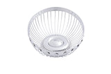 A round, empty Regent Basket made of shiny stainless steel with an open design. The wire rods curve outward from a solid circular base, forming a bowl shape. This TableCraft basket sits on a white background.