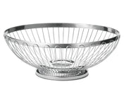 A round, silver stainless steel basket with an open design, wide rim, and sturdy circular base. The evenly spaced vertical wires curve outward for an airy, modern look. This TableCraft 6174 Regent Basket is set against a plain white background.