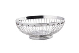 A shiny, round stainless steel Regent Basket by TableCraft Products, featuring an open design with a wide rim and small circular base. Curved metal wires create a simple, modern look, perfect for displaying fruit or decor.