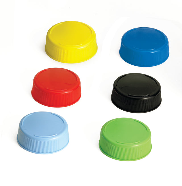 Six plastic bottle caps, including some suitable for 63mm squeeze bottles and Invertatop End Cap designs, are arranged in two rows on a white background. The caps—yellow, blue, red, light blue, green, and black—are round and ribbed on the side.