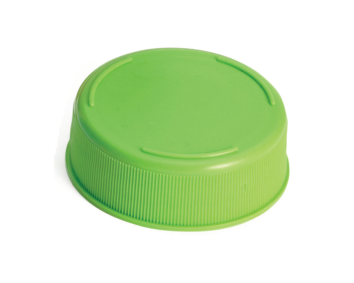 A close-up of a green Invertatop End Cap, commonly used for 63mm squeeze bottles, is shown lying on its side against a plain white background. The ridged sides offer grip, while the smooth top features two shallow curved grooves.