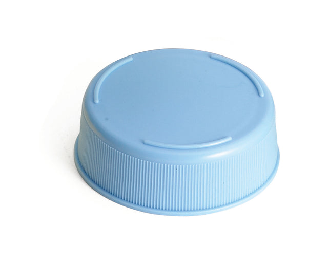 A light blue 63mm squeeze bottle end cap is shown upside down on a white background. The cap has a slightly textured, ribbed side for grip and a smooth top surface with three short, raised curved lines near the edge.