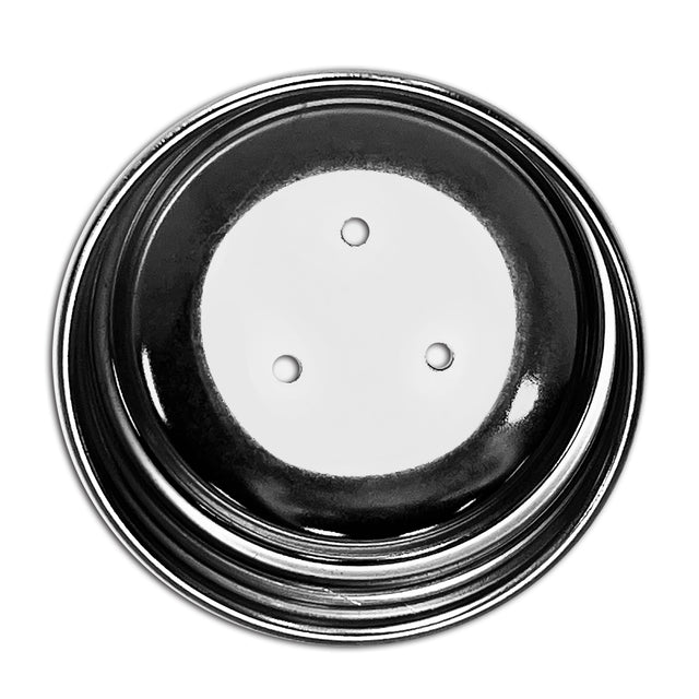 A metal shaker lid, viewed from above, with three evenly spaced holes in the center. The shiny silver surface contrasts with the matte area around the holes. This TableCraft 653 Replacement Top is dishwasher safe and shown on a clean, white background.