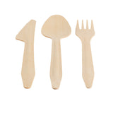 Three light-colored wooden utensils—a serrated knife, a broad-bowled spoon, and a three-tined fork—are arranged vertically on a white background. This 6-1/2" disposable utensil set by TableCraft Products features flat handles and an unfinished texture.