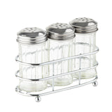 Three empty glass shakers with stainless steel tops sit side by side in a silver metal holder. The shakers have ridged sides and perforated tops for dispensing spices, making this condiment dispenser set both functional and stylish against a white background.