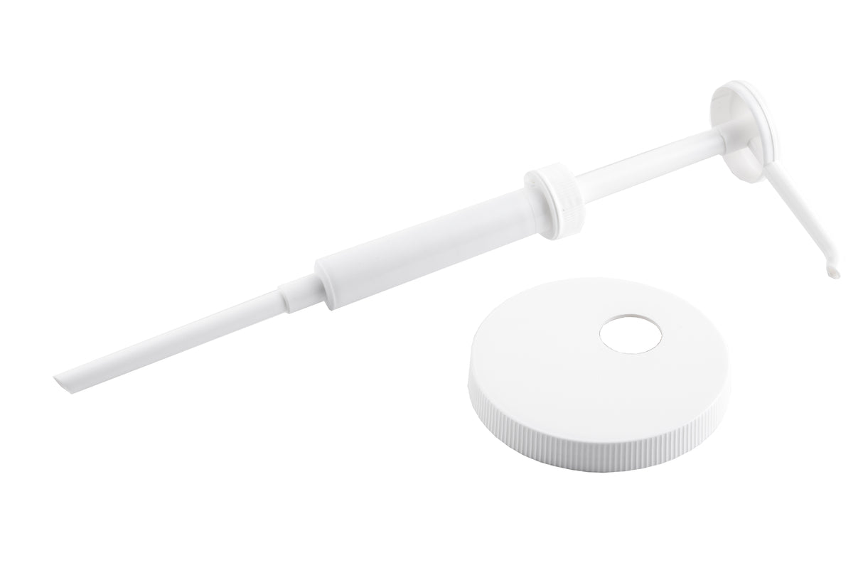 A white plastic 1 oz. economy pump dispenser with a long nozzle lies next to a matching, dishwasher safe screw-on bottle cap with a hole in the center, both set against a plain white background.