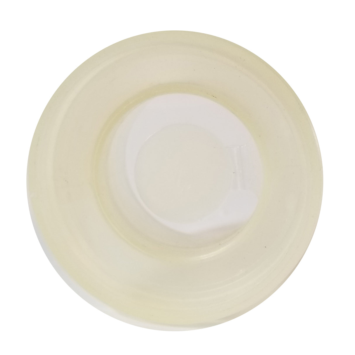 A clear, round petri dish with a slightly yellowish tint, viewed from above, showing smooth edges and a flat center—similar in clarity to TableCraft Products 663 or a pristine flapper valve. The dish is empty and set on a plain white background.