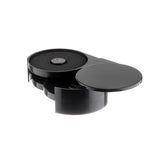 A sleek, round, black plastic rimmer with three swing-out trays, partially open to reveal foam padding inside. Each tray holds a small, flat, circular metal object in the center. The background is white.