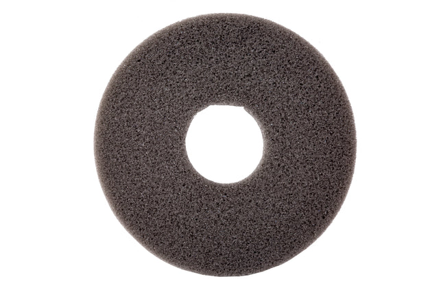 A dark gray, circular foam pad with a coarse texture, photographed on a white background. This replacement sponge features a large central hole, resembling a donut or ring shape. The lighting highlights its porous surface details.