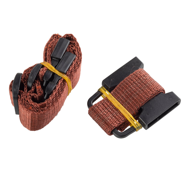 Two brown nylon replacement straps with black plastic buckles are shown. One strap is tightly coiled and secured with a yellow rubber band; the other is folded, also held together with a yellow band. Both are set against a white background.
