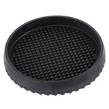 A sturdy round black rubber drip tray with a raised rim and textured surface covered in short, evenly spaced nubs. The ridged outer edge adds grip, making it perfect as a pitcher drip tray for holding or catching spills securely.