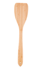 The TableCraft 700006 bamboo turner features a wide, flat, slightly curved blade and a long handle. This solid kitchen utensil is crafted from light-colored wood with visible grain patterns and a small hole for hanging. White background.
