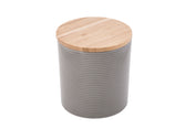 A cylindrical canister with a matte gray body featuring horizontal ridges and a flat, round bamboo lid with visible wood grain. The lid contrasts with the smooth, patterned surface, giving this canister a modern, minimalist look.