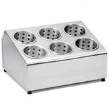A stainless steel flatware cylinder holder with six round, perforated compartments in two rows of three, designed for organizing kitchen tools like cutlery or ladles. The slanted front unit has small black feet and is dishwasher safe for easy cleaning.