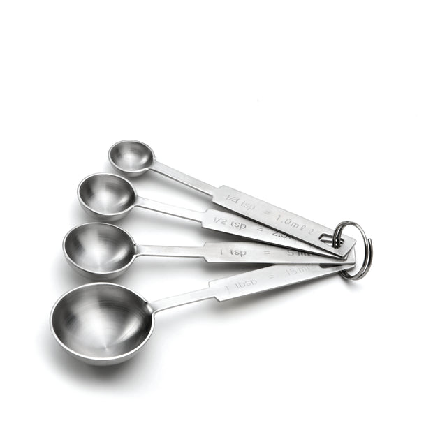 Four dishwasher safe stainless steel measuring spoons (1 tbsp, 1 tsp, 1/2 tsp, 1/4 tsp) nest together on a metal ring. Each measuring spoon features engraved measurement markings on the handle for easy use.