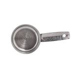 A stainless steel measuring cup with a flat handle is shown on a white background. The handle is engraved with “1/3 cup,” “80 ml,” and “STAIN” for stainless steel. The cup is clean, empty, and seen from above; it’s also dishwasher safe.