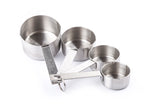 A set of four stainless steel measuring cups in different sizes, nested together and attached by a metal ring, displayed on a white background. Each dishwasher safe cup has clear measurement markings on the handles for easy use.