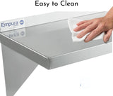 A hand wipes a stainless steel shelf with a white cloth. The smooth, clean wall mount storage shelf features an “Empura Stainless” label and NSF logo. Text at the top says “Easy to Clean.”.